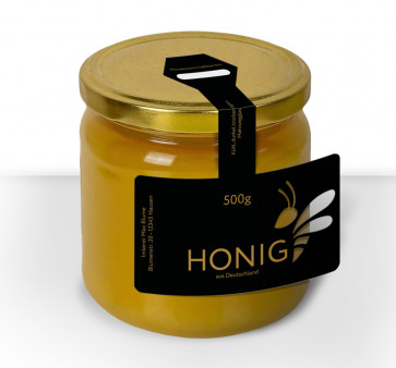 "Black Lady"- Ausschnitt und Golddruck auf gold-schwarzem Honigetikett 