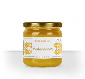 Kleines Etikett "Wabenhonig" auf Glas