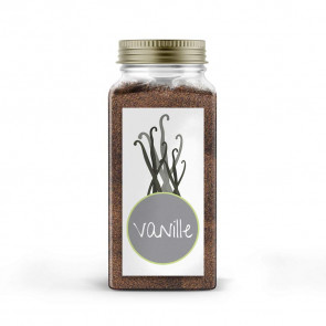 Kleines Gewürzetikett "Vanille" auf gefülltem Glas 