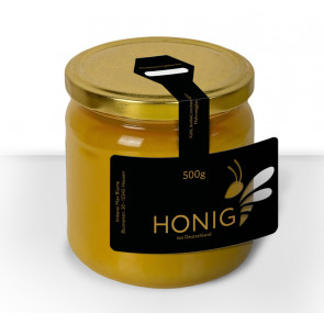 "Black Lady"- Ausschnitt und Golddruck auf gold-schwarzem Honigetikett 