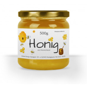 Etiketten "Honigland" gedruckt weißem Papier auf Honigglas