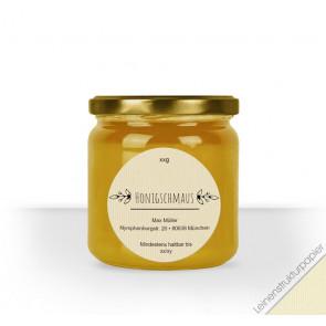 Rundes Etikett "Klassik Times" auf cremefarbigem Leinenstrukturpapier