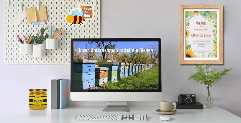 Bienenpatenschaftsurkunden h&auml;ngen an der Wand; Bildschirm auf Schreibtisch zeigt Bienenbeuten